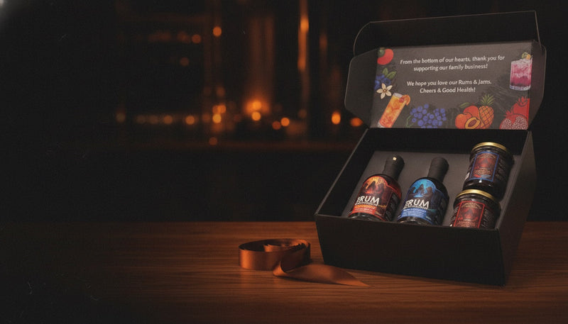 The Rum Infusionist gift box with miniature rums and jams