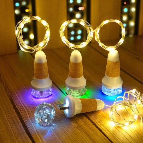 Bottle light stoppers glowing in colour