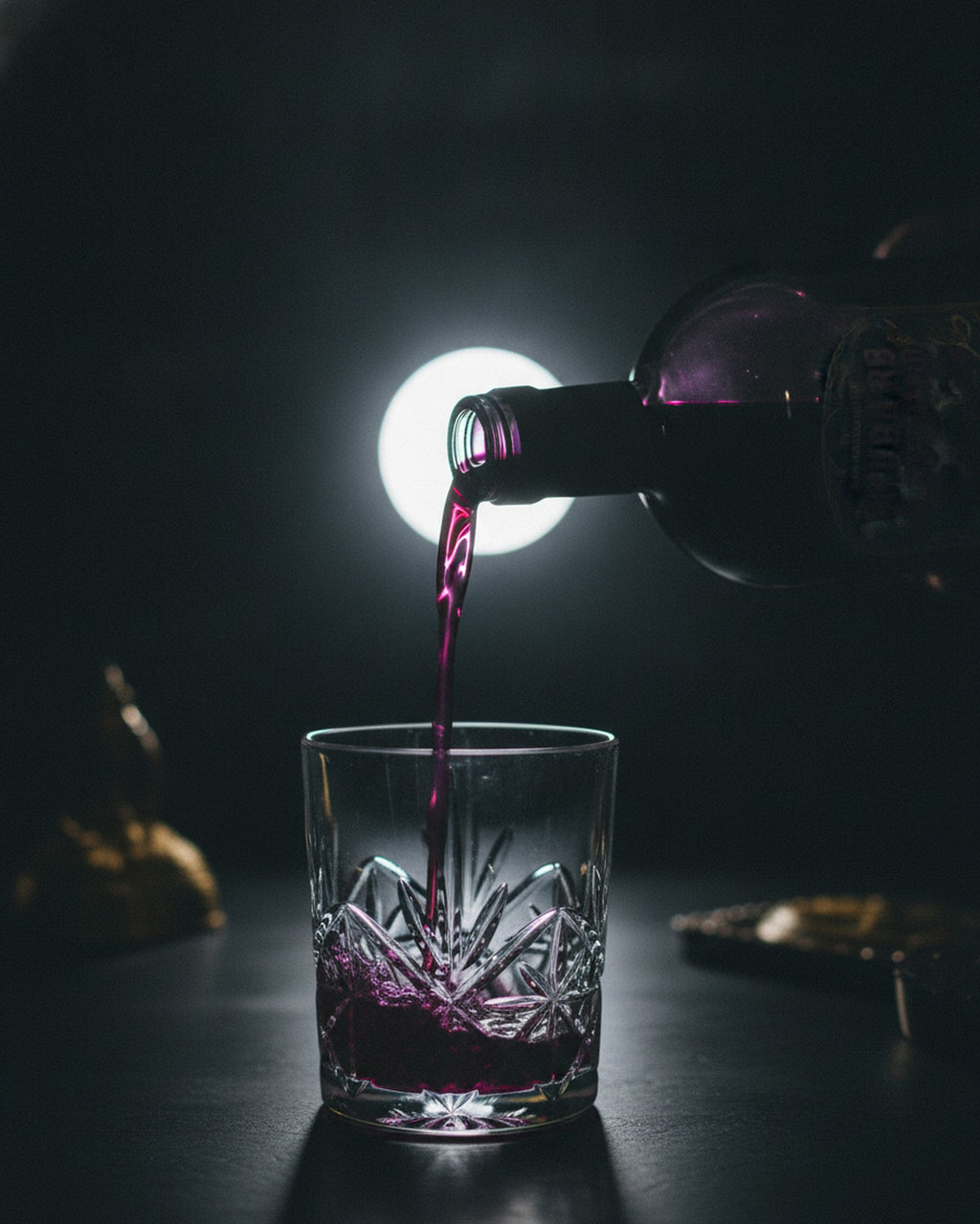 The pour: deep purple Rhubarb & Custard Witching Hour falling into the glass